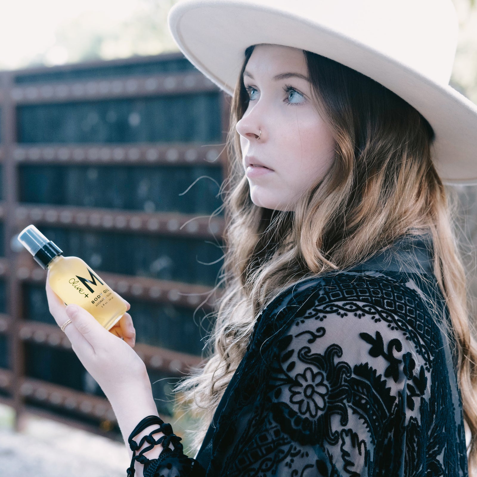 Hydrate + Glow Body Oil in use