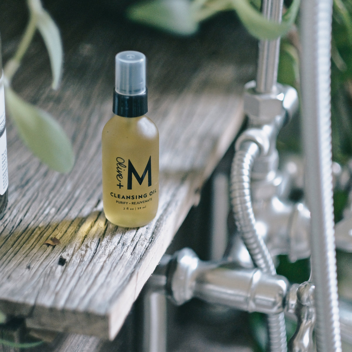 Purify + Rejuvenate Cleansing Oil in use